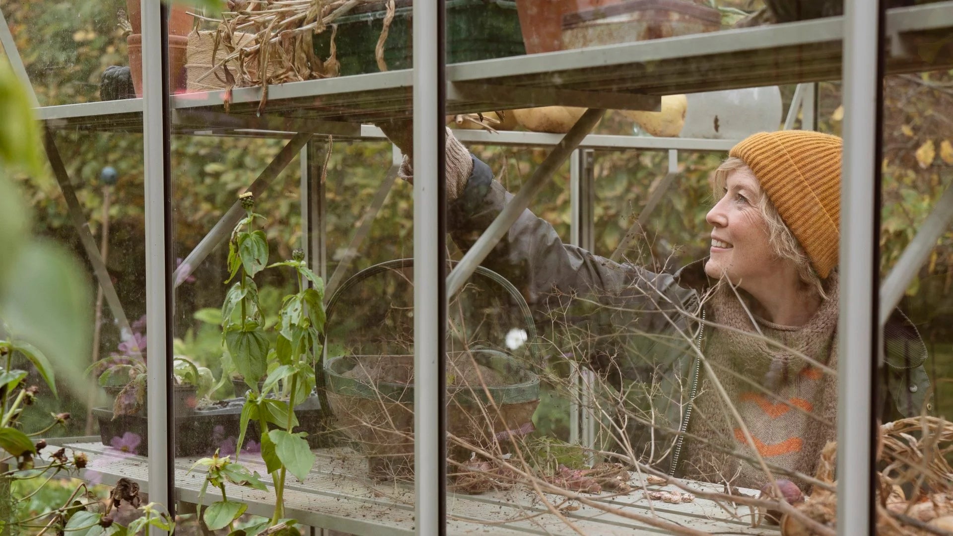 Kathy in her Rhino Greenhouse