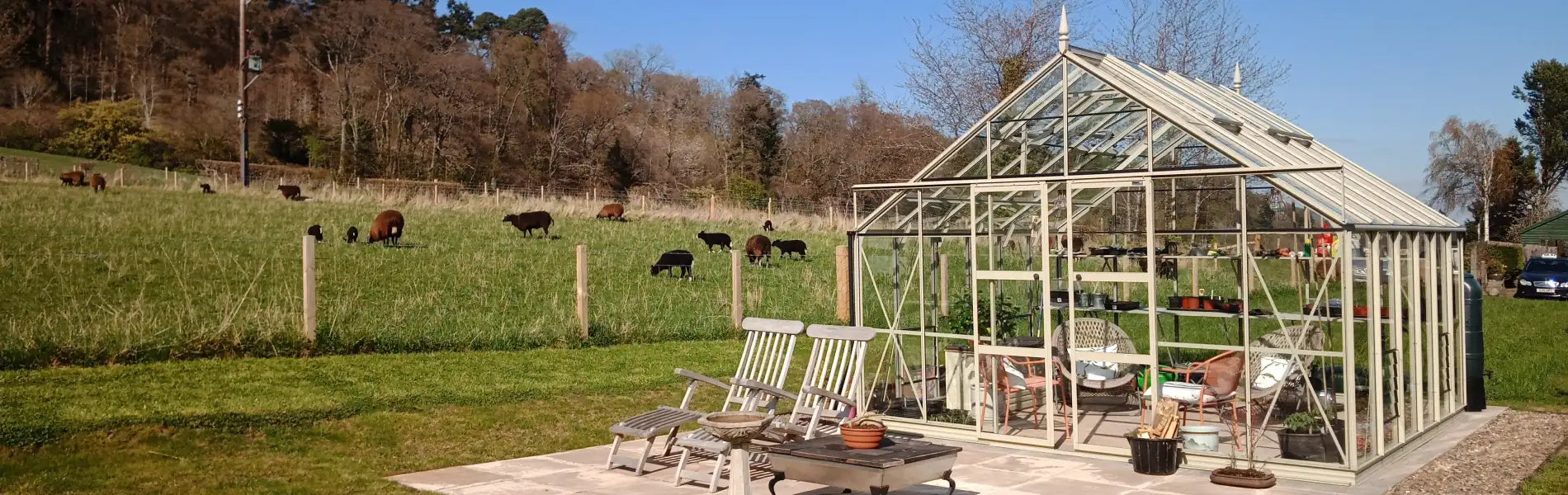 Rhino greenhouse next to a field