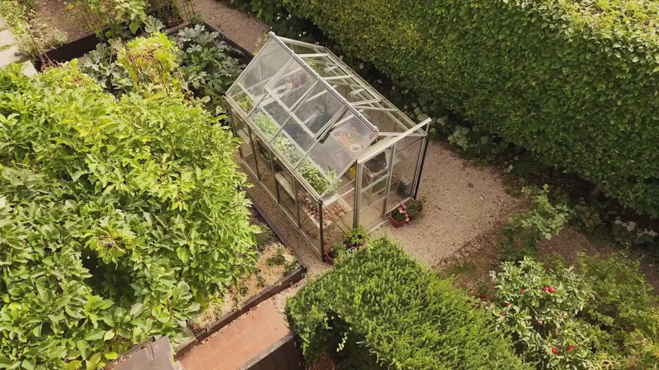 A rhino Greenhouse in a rural garden